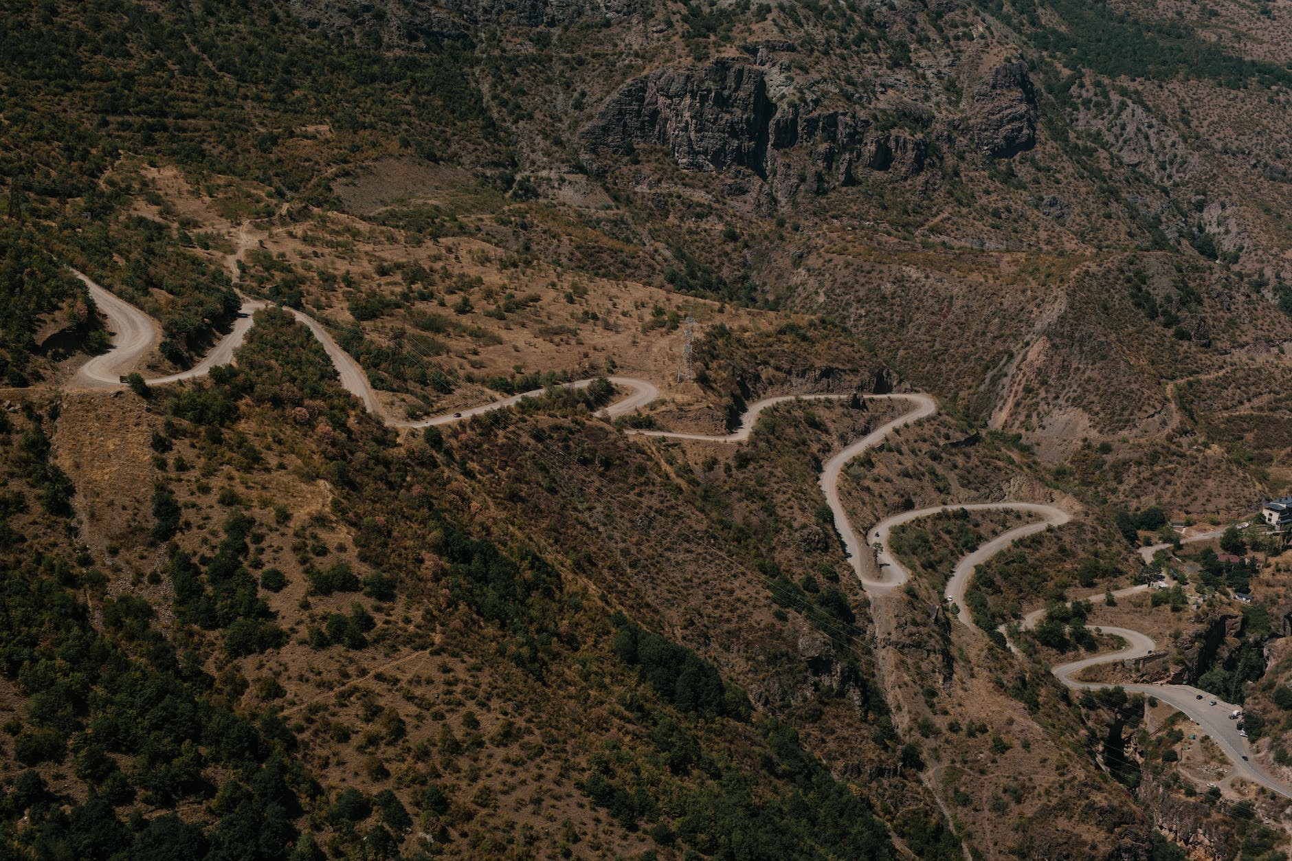 asphalt winding roadway on mountain slope